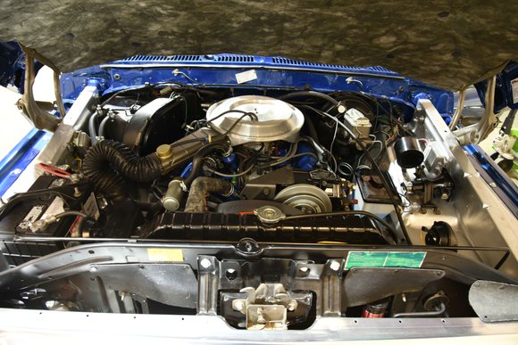 Completed Ford 400 V8 engine with chrome air cleaner and detailed components